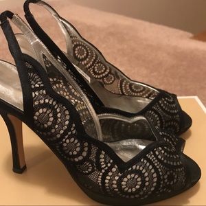 Black fabric lace sling back pump